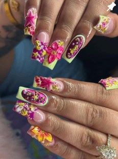 Vibrant custom nail set with hand-painted florals, bows, and tiny details by Karli