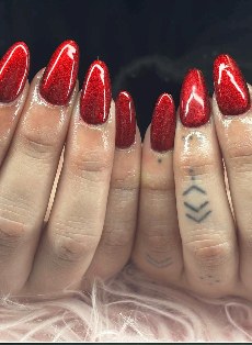 Cherry red glitter almond nails with glossy finish